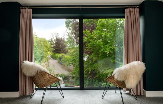 large bedroom window with a view 