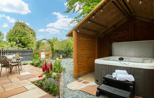 Hot tub in country garden