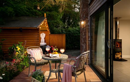 Patio with hot tub and patio window
