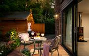 Patio with hot tub and patio window