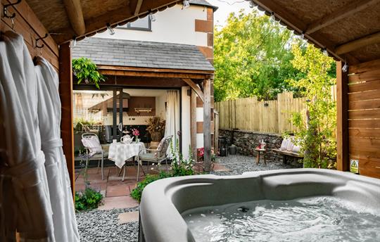 Hot tub in country garden