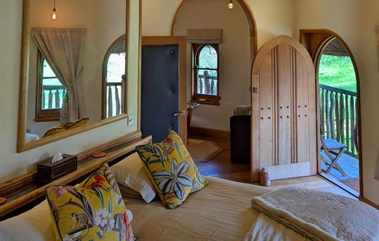 Bedroom door opens onto the balconay