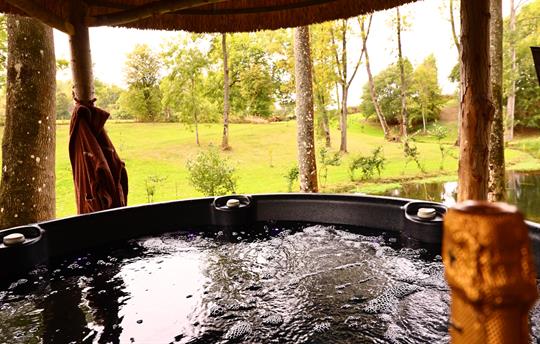 Preheated hot tub over looking the lake