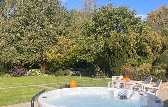 Hot tub at Garden Cottage with private garden view