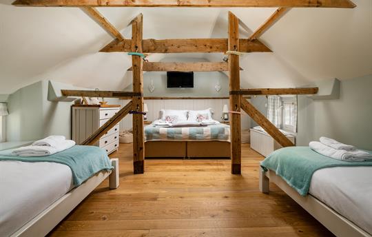 Family room upstairs sleeps four guests