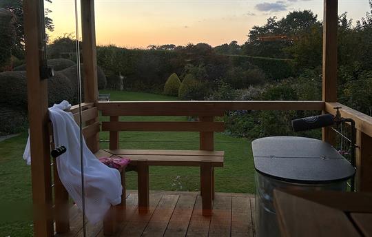 Sun set over the garden, view from the sauna