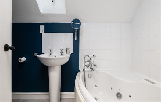 Enjoy a soak in our Corner Spa Bath, ensuite 2