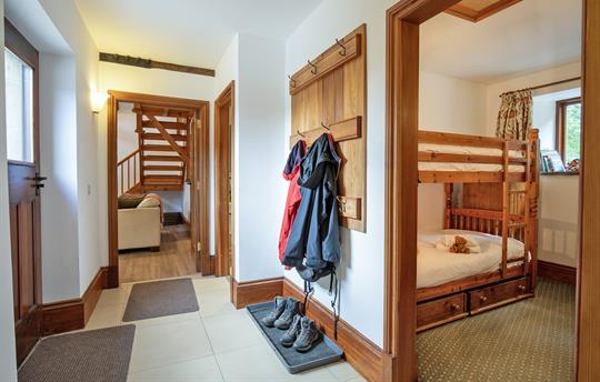 Coach House hallway and bunk room