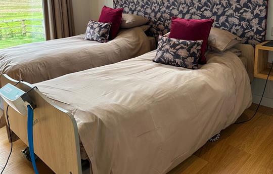 Twin bedded room, hired accessible adjusting bed