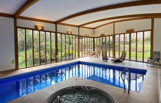 Swimming pool and hot tub at The Cottage Beyond