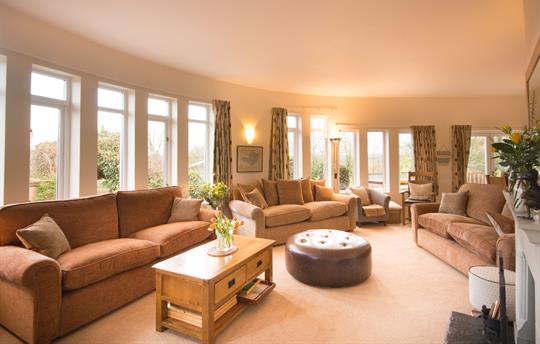 Comfy, large, curvaceous lounge