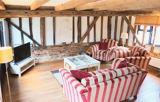 Granary lounge overlooking front pond and decking