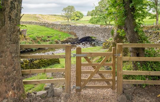 Gate to private beckside picnic area