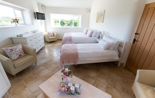 Valley View Cottage bedroom and seating area for 3