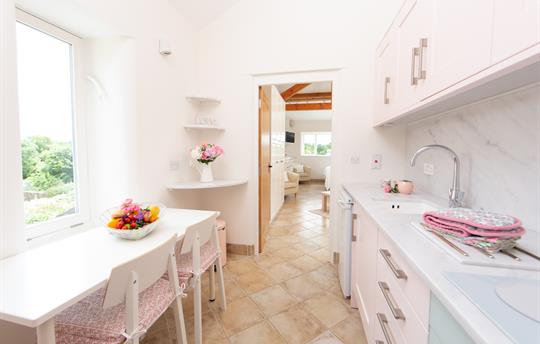 Clean, well equipped kitchen & dining table for 3 