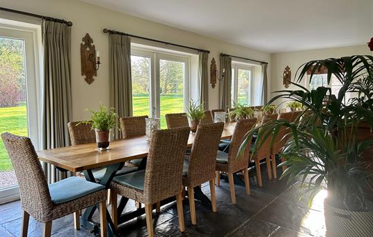 Dining area can seat  24 at one long table