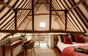upstairs double bedroom with exposed roof