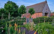 Hoste Barn from the flower garden
