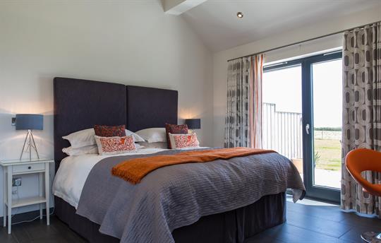 Spacious, underfloor heated bedroom with a view!