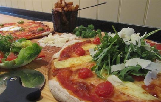 Delicious homemade pizzas delivered