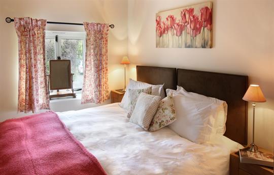 A Super king or twin bed with Soak & Sleep bedding