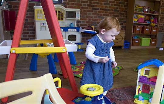 under 5's area with child