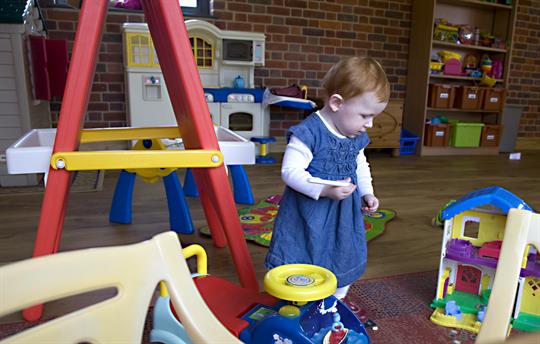 under 5's area with child