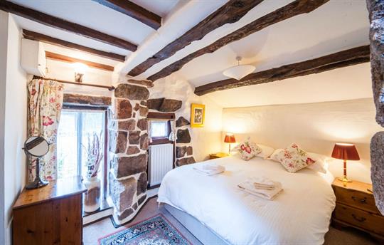 Romantic beams and kingsize bed 