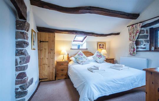 Romantic bedroom with kingsize bed