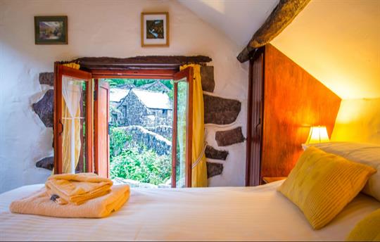 Romantic kingsize bed with views