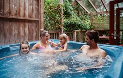 Family in the hot tub