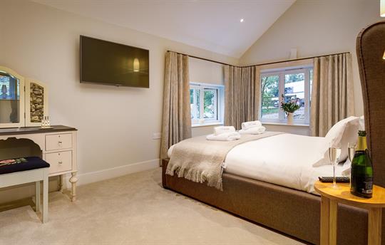 There are TVs in each bedroom