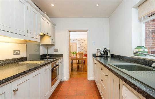 Kitchen leading to dining room