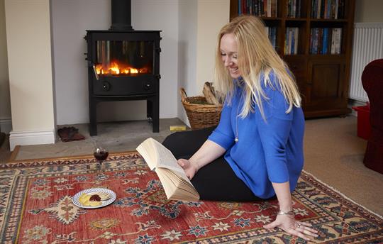 Reading Book by Fire